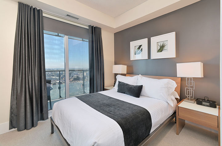 A bedroom in a suite at 300 Front St.