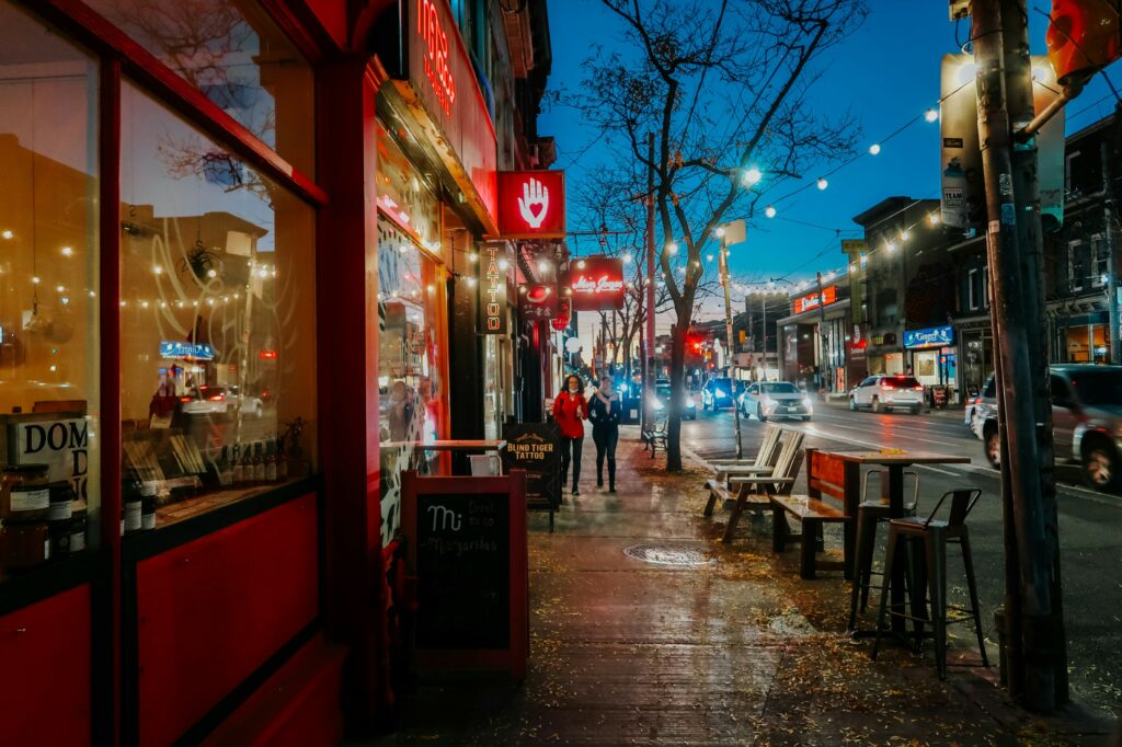 A street in a Toronto neighborhood at dusk.