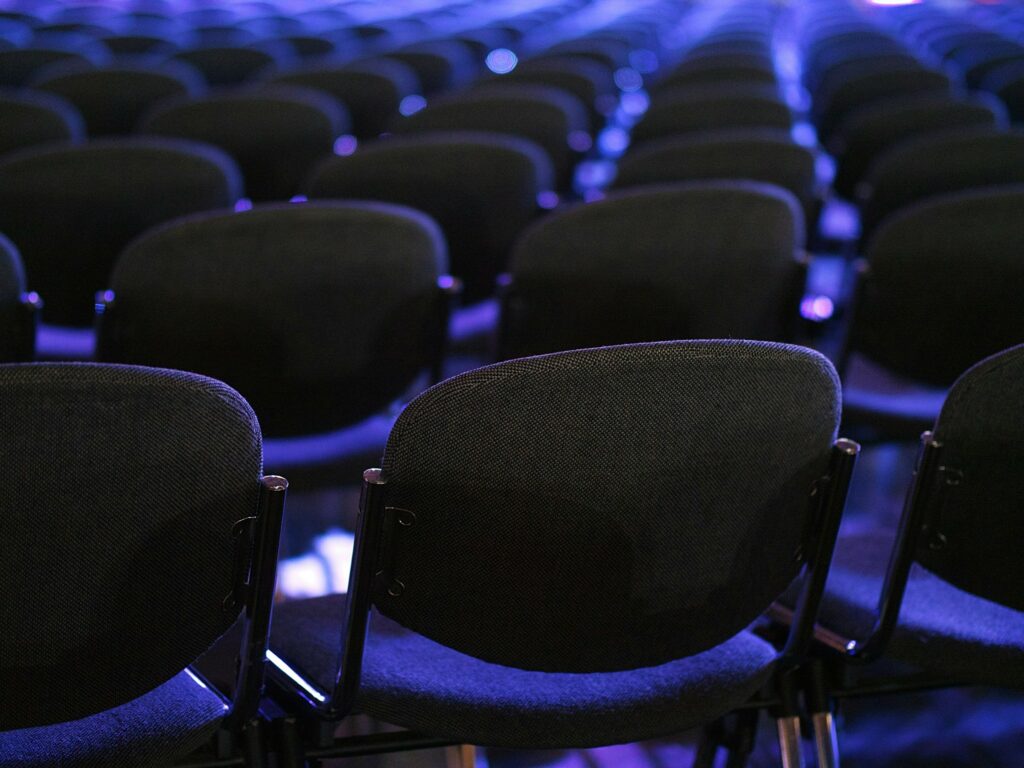 Rows of chairs in a conference setting.